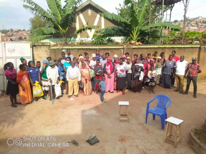 Mengo Youth Development Link food and clothes donations in Masanafu